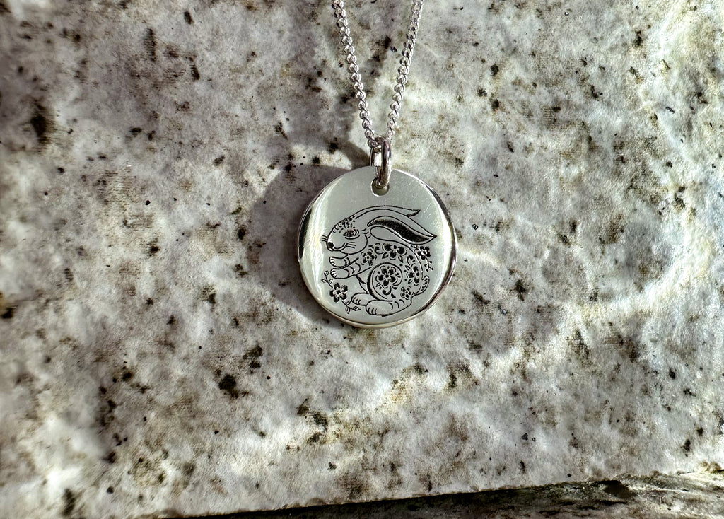 Fine Sterling Silver curb chain with link attaching Sterling Silver disc pendant with Lunar New year Rabbit drawing engraved 