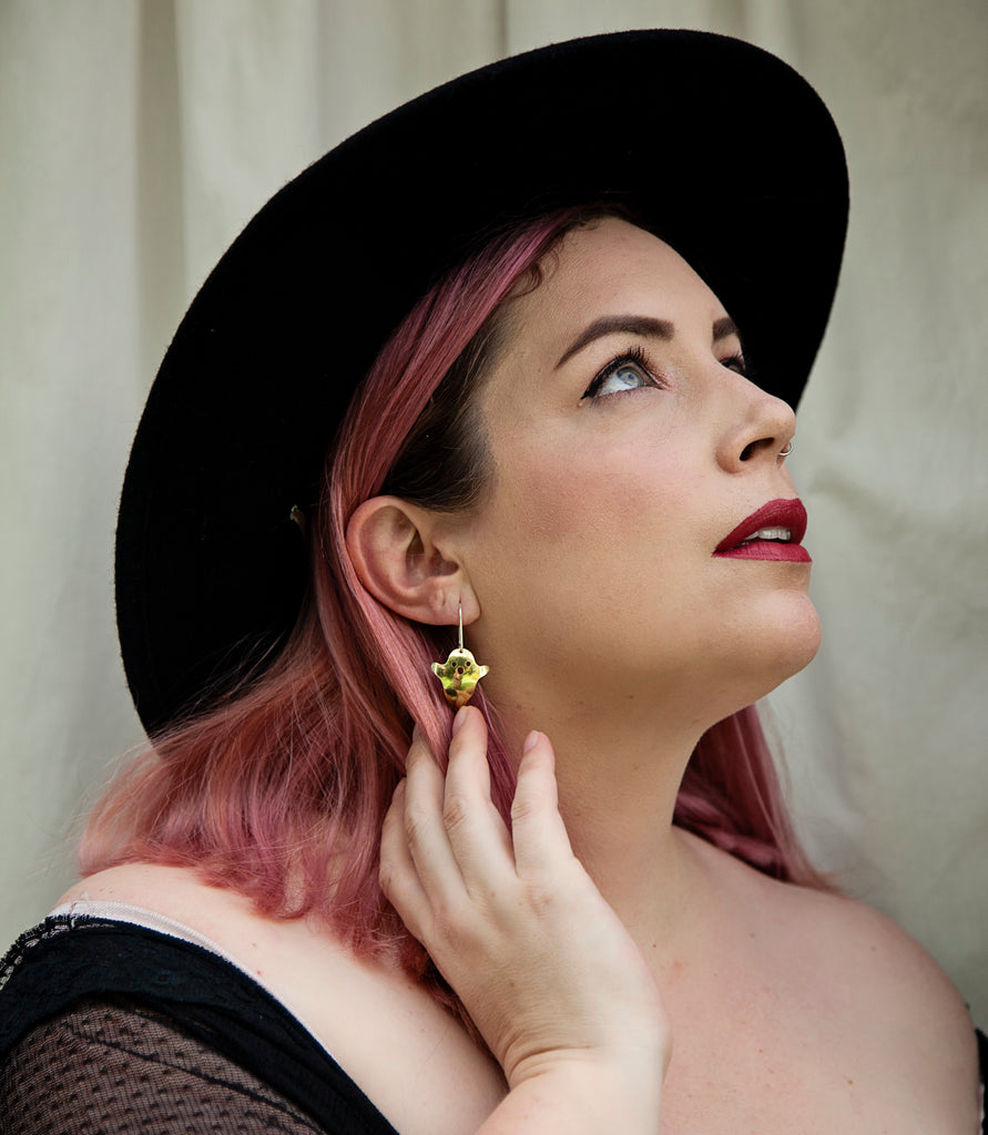 Casper Ghost earrings made from Brass with Sterling Silver hooks. 