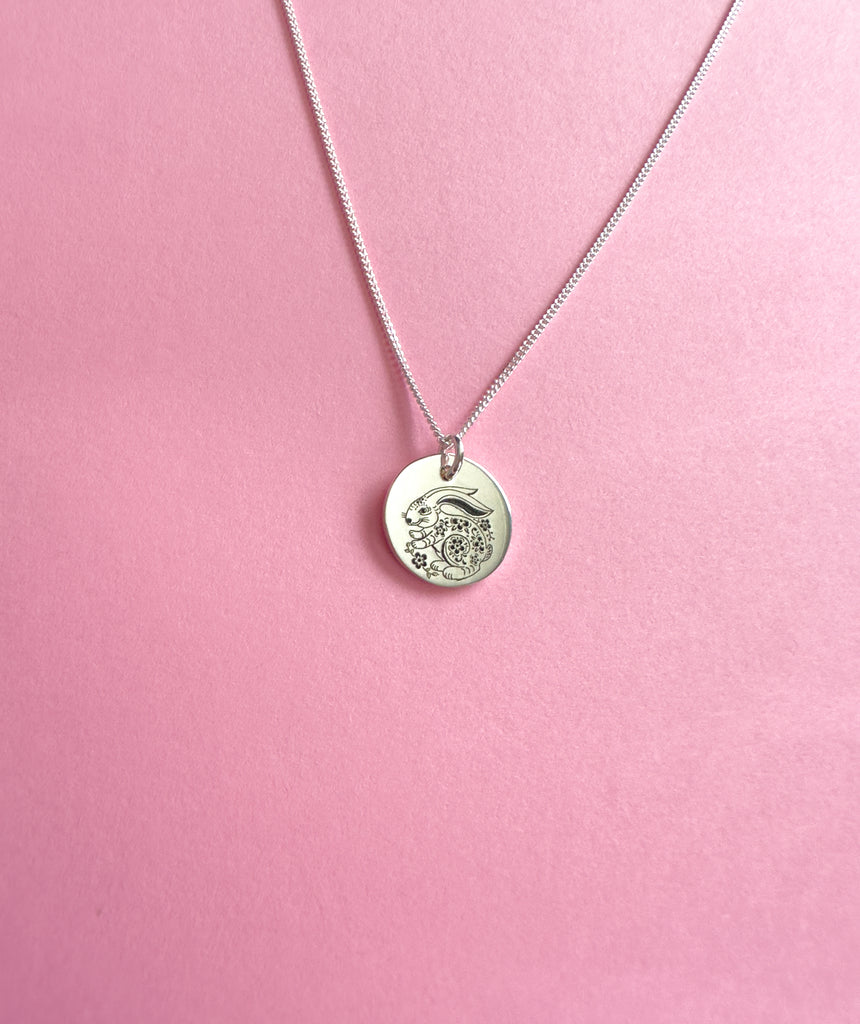 Fine Sterling Silver Curb chain with link attaching round circle disc pendant with Rabbit engraved design
