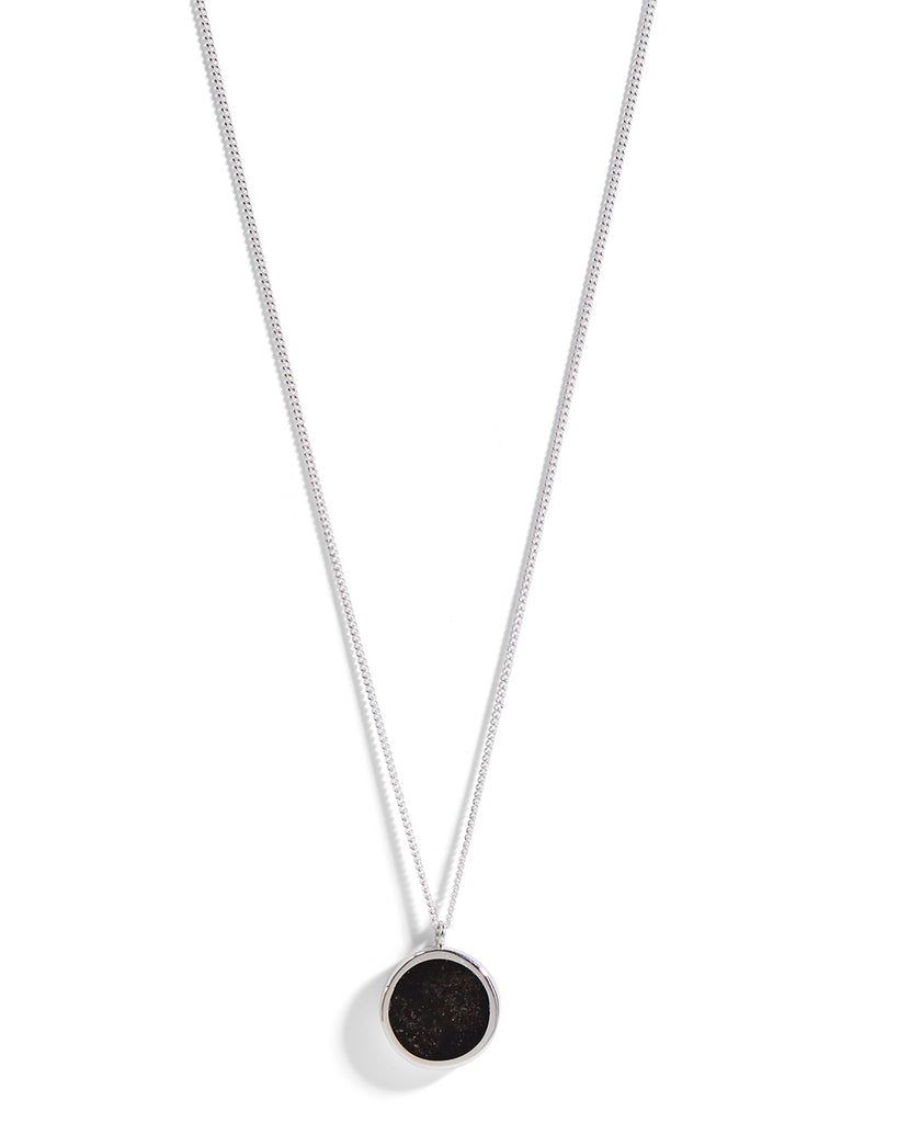 African Blackwood pendant necklace set in sterling silver setting with a fine silver chain and link