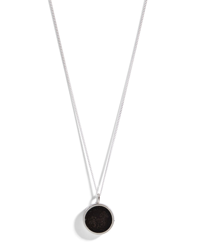 African Blackwood pendant necklace set in sterling silver setting with a fine silver chain and link