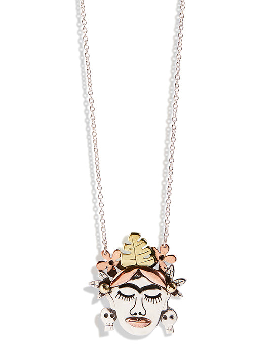 Frida Kahlo pendant made from Sterling Silver, Brass and Copper with a Sterling Silver chain. Some parts of the Sterling Silver is oxidised. 